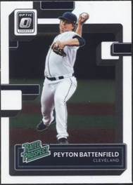 A baseball player holding a bat

Description automatically generated