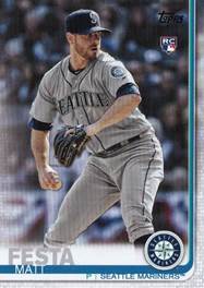 A baseball player holding a glove

Description automatically generated