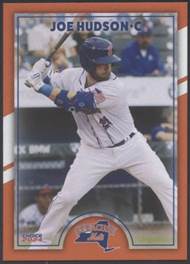 A baseball player holding a bat

Description automatically generated