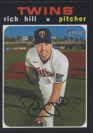 A baseball player holding a baseball glove

Description automatically generated with low confidence