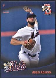 A baseball player throwing a ball

Description automatically generated