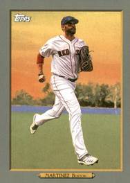 A baseball player running with a glove

Description automatically generated