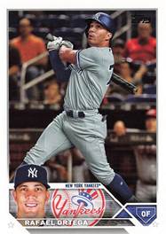A baseball player holding a bat

Description automatically generated