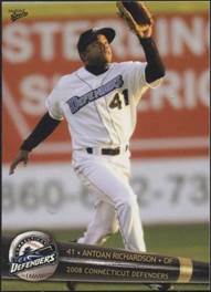 A baseball player throwing a baseball

Description automatically generated