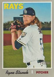 A baseball player with a glove

Description automatically generated