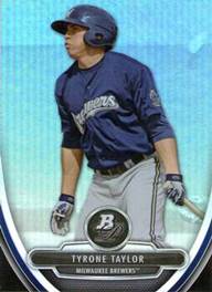 A baseball player with a bat

Description automatically generated