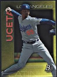 A baseball player with a bat

Description automatically generated