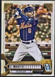 A baseball player holding a bat

Description automatically generated
